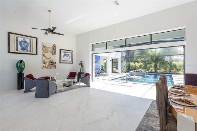 living room with ceiling fan