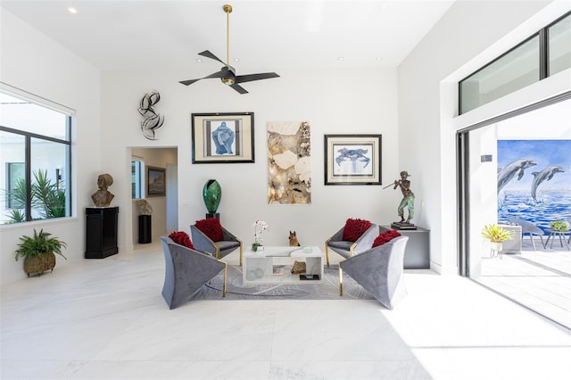 living room featuring ceiling fan