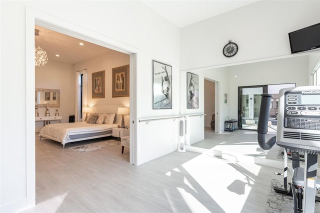 interior space featuring connected bathroom and light hardwood / wood-style floors