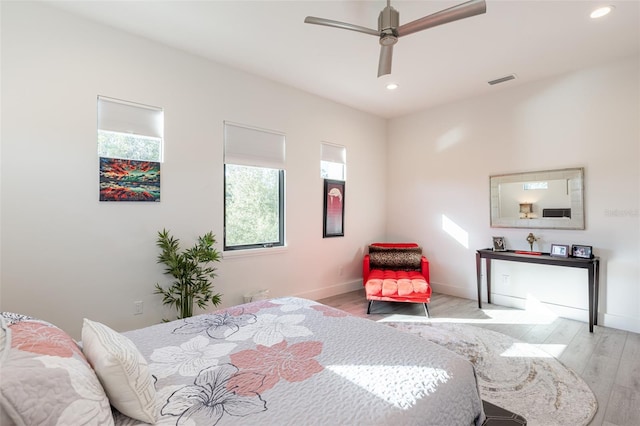 bedroom featuring ceiling fan and light wood-type flooring