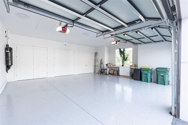 garage featuring a garage door opener