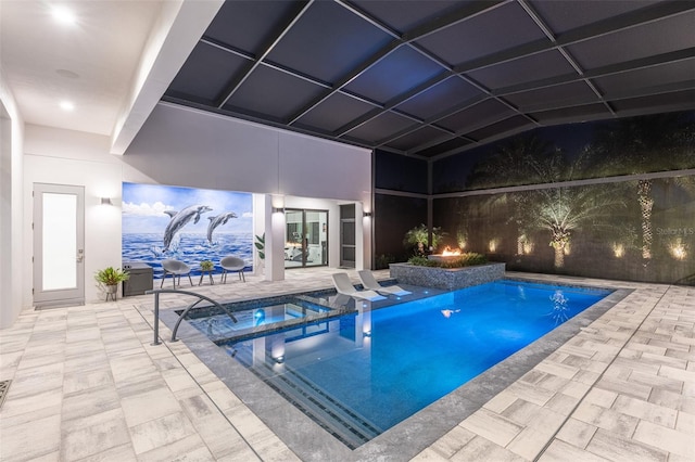 view of swimming pool with an in ground hot tub and a patio