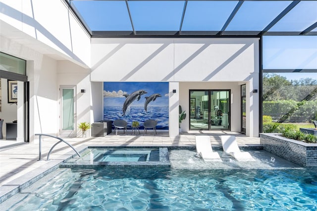 view of pool featuring a lanai, an in ground hot tub, and a patio