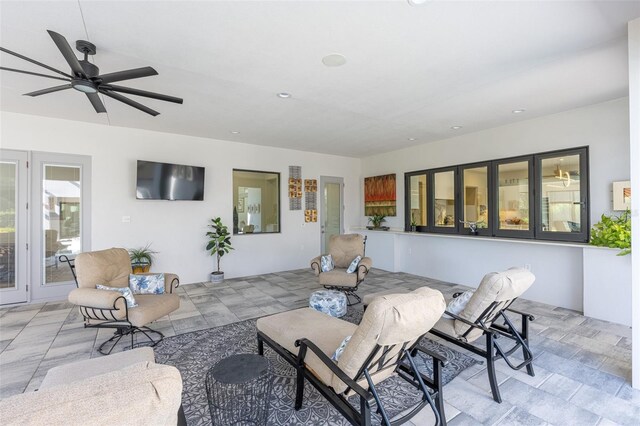 living room with ceiling fan