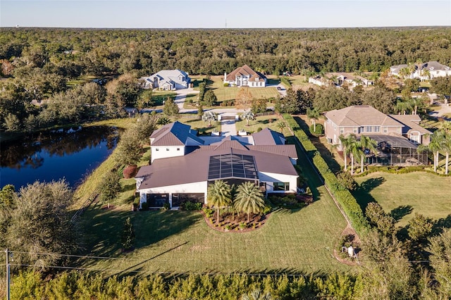 bird's eye view with a water view