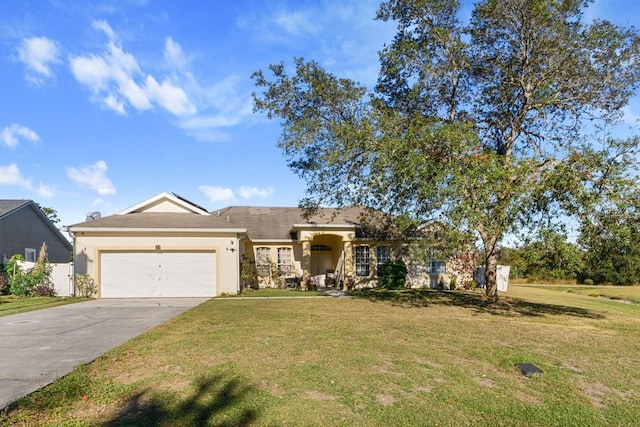 view of front of property with a garage and a front yard