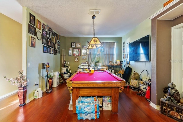 playroom featuring wood-type flooring, a textured ceiling, and pool table