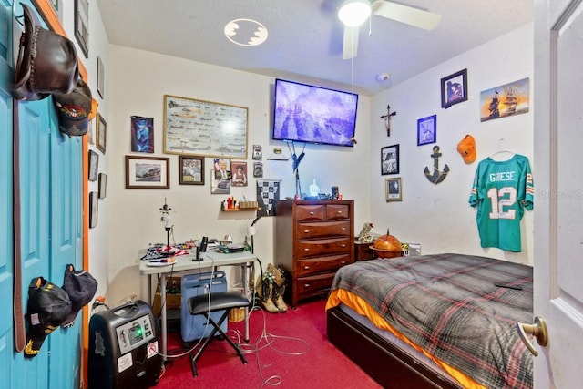 bedroom featuring ceiling fan, carpet floors, and a closet