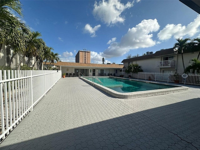 view of swimming pool featuring a patio