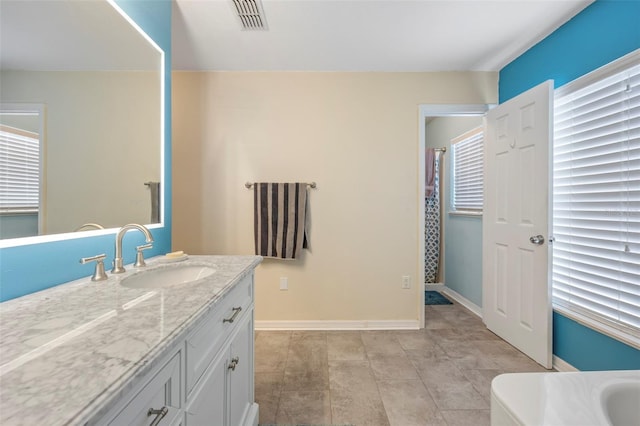 bathroom featuring vanity