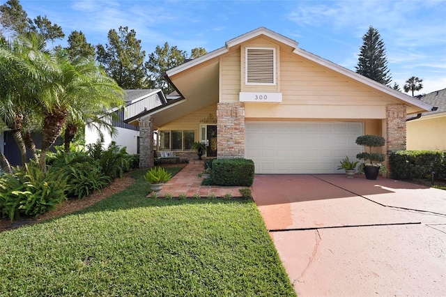 view of front facade with a garage and a front lawn