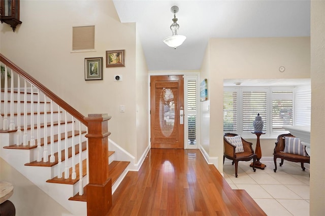 entryway with light wood-type flooring