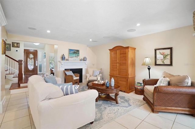 300 Spring Run Cir, Longwood, FL 32779 - living area featuring stairway, light tile patterned floors, a fireplace, and recessed lighting