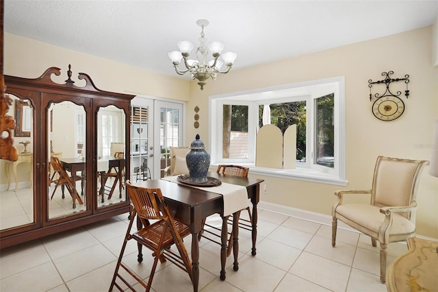 300 Spring Run Cir, Longwood, FL 32779 - dining room featuring a chandelier, light tile patterned floors, baseboards, and french doors