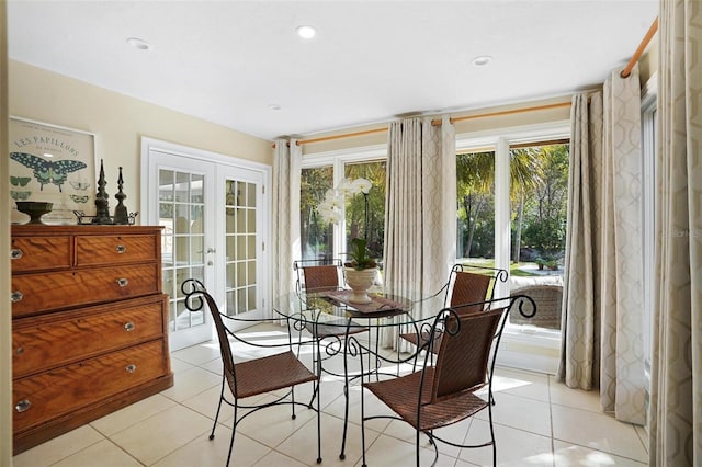 300 Spring Run Cir, Longwood, FL 32779 - dining space with healthy amount of natural light, french doors, and light tile patterned flooring