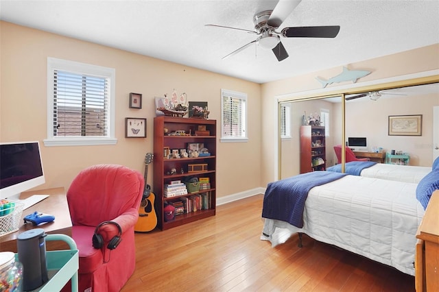 300 Spring Run Cir, Longwood, FL 32779 - bedroom with hardwood / wood-style flooring, multiple windows, a closet, and ceiling fan