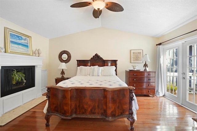 300 Spring Run Cir, Longwood, FL 32779 - bedroom with access to outside, light wood-style flooring, lofted ceiling, a ceiling fan, and french doors