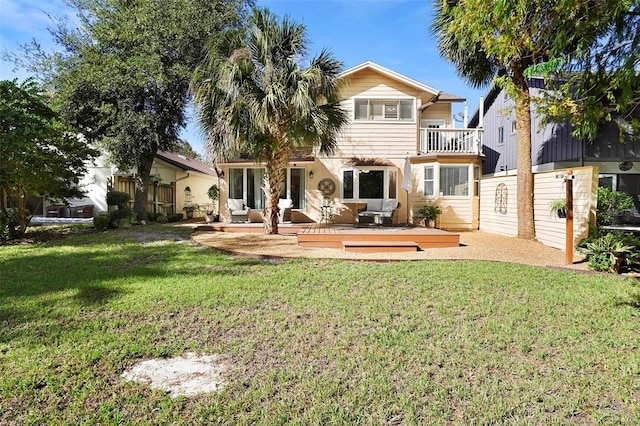 300 Spring Run Cir, Longwood, FL 32779 - rear view of property featuring a lawn, a deck, and a balcony
