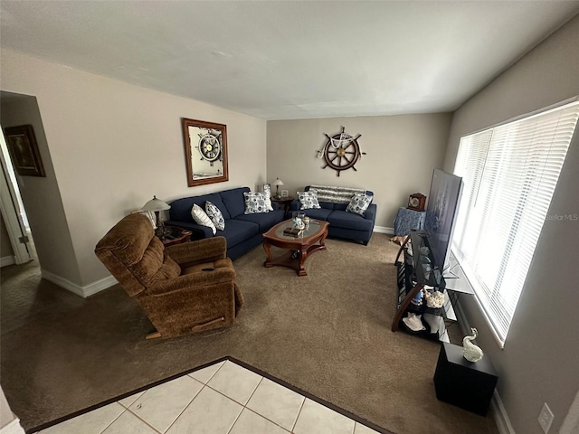 carpeted living room featuring vaulted ceiling