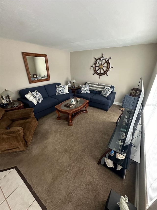 living room with carpet flooring and a wealth of natural light