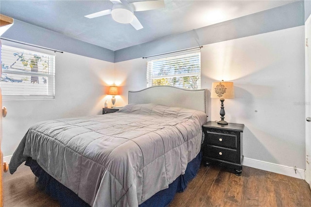 bedroom featuring ceiling fan and dark wood-type flooring