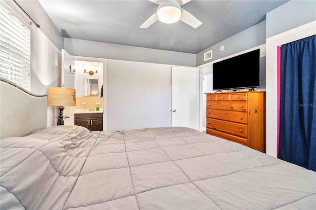 bedroom with connected bathroom and ceiling fan