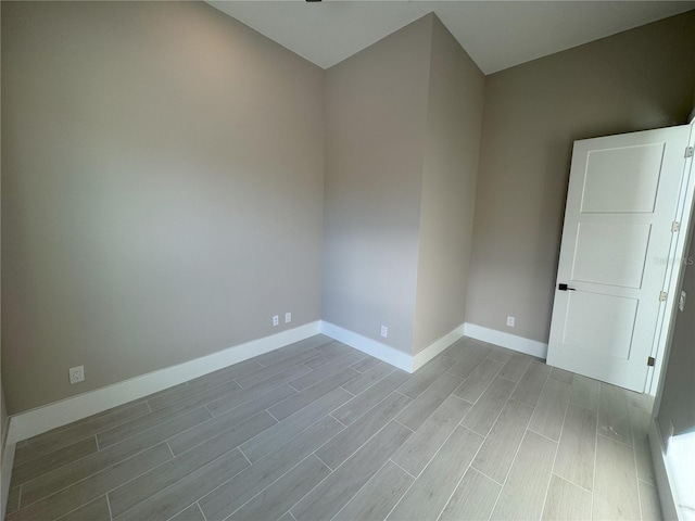 unfurnished room with light hardwood / wood-style flooring