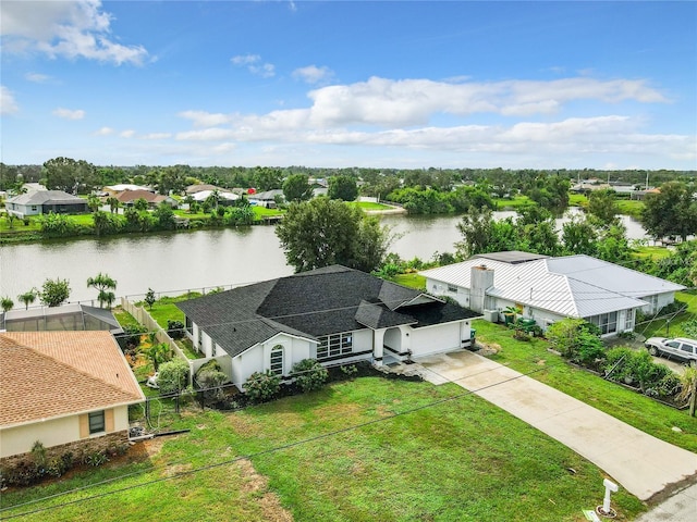 drone / aerial view featuring a water view