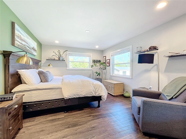 bedroom featuring dark hardwood / wood-style floors