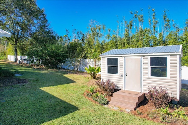 view of yard with a storage unit