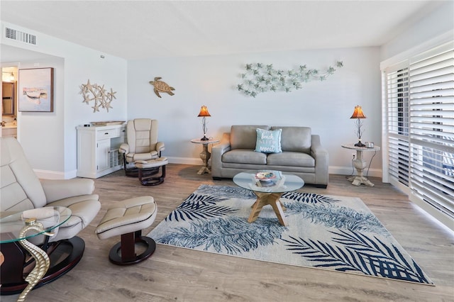 living room featuring light wood-type flooring