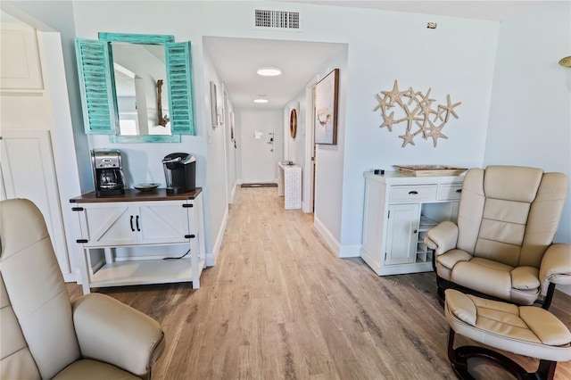 hall featuring light wood-type flooring