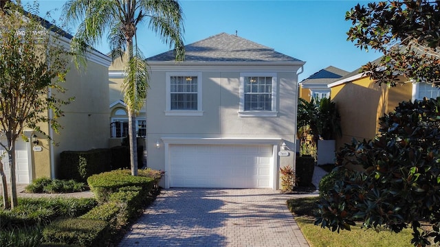 view of front of home with a garage