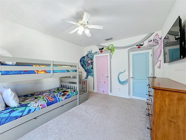 bedroom featuring ceiling fan and light colored carpet