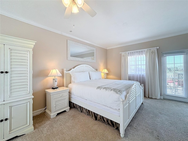 bedroom with ceiling fan, crown molding, and light colored carpet