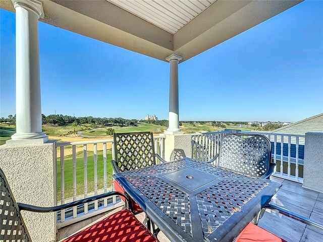 wooden deck with a yard