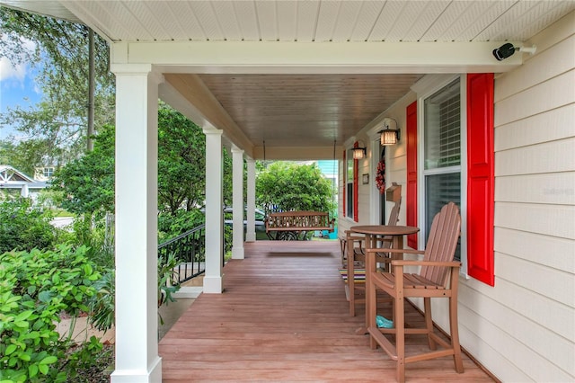 deck featuring covered porch