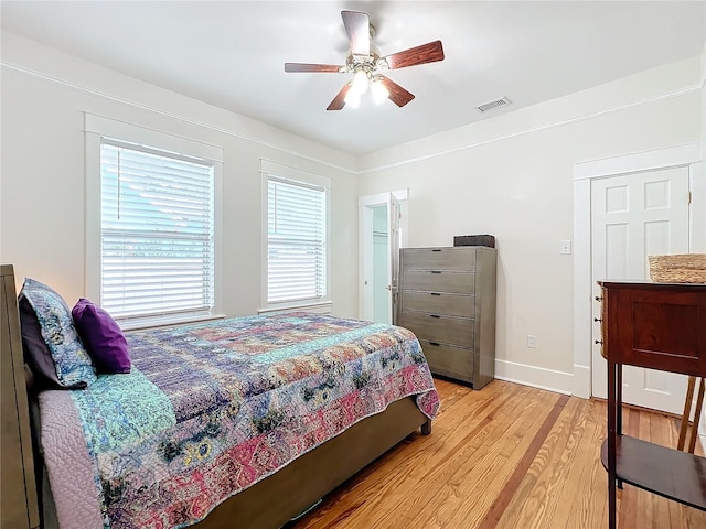 bedroom featuring ceiling fan and light hardwood / wood-style flooring