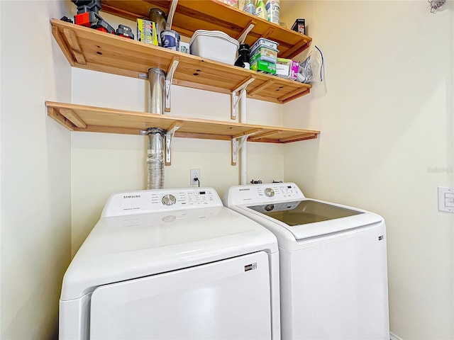 laundry room with washer and dryer