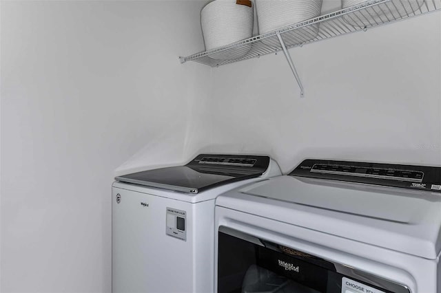 laundry room with independent washer and dryer