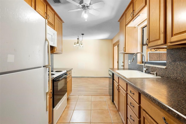 kitchen with white appliances, ceiling fan with notable chandelier, sink, tasteful backsplash, and light tile patterned flooring