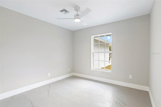 unfurnished room with ceiling fan