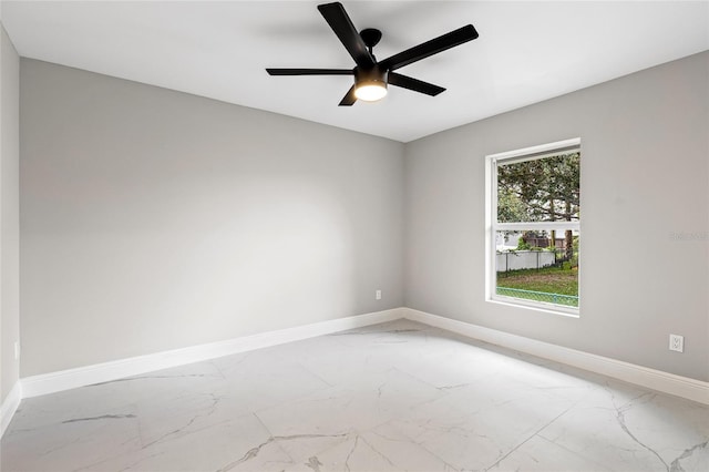 empty room featuring ceiling fan