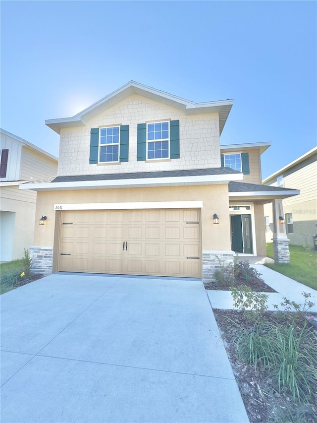 view of front of house with a garage