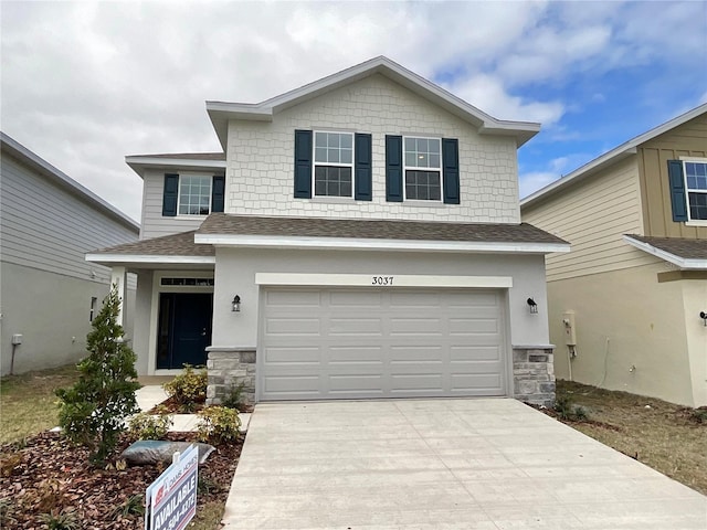 view of front of home with a garage