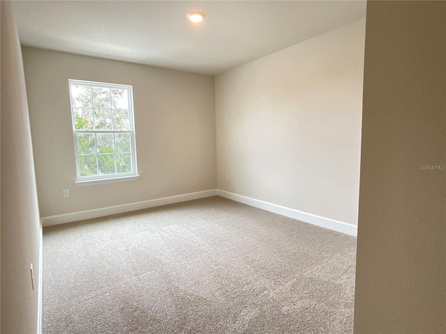 view of carpeted spare room