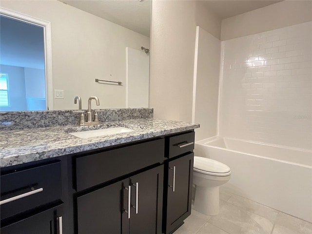 full bathroom featuring bathtub / shower combination, vanity, and toilet