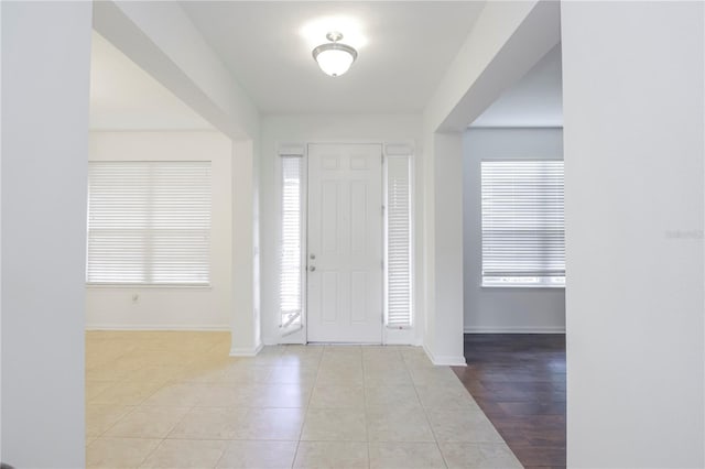 foyer with light tile patterned floors