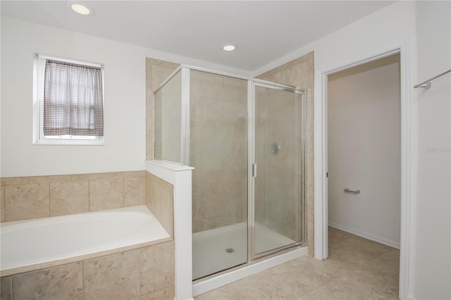 bathroom with separate shower and tub