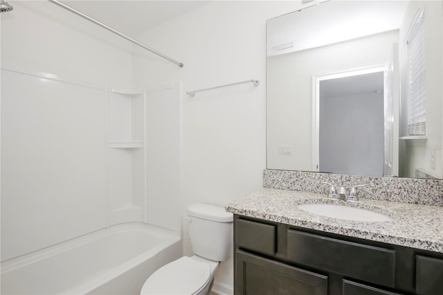 full bathroom featuring shower / bathing tub combination, vanity, and toilet